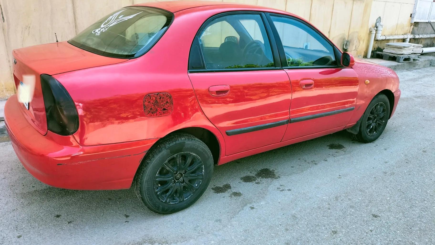 لانوس ٢٠٠٢ كاملة كهربا رخصة ٣ سنين