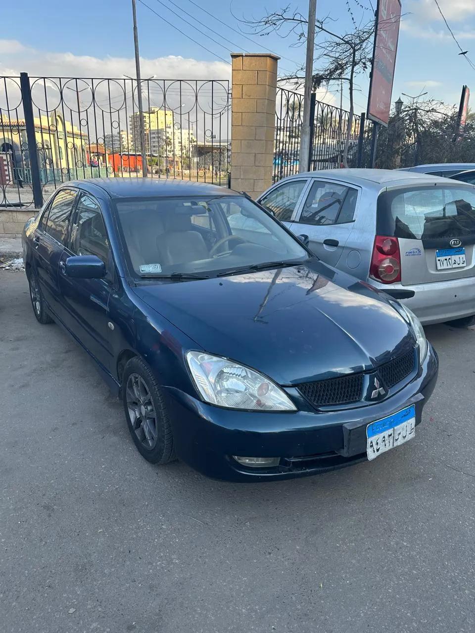 لانسر بومه اتوماتيك 2004