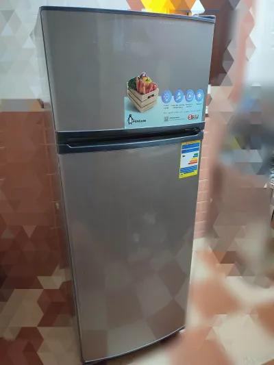 ثلاجه بنجوين بابين ديفروست سعة ٣٠٢ لتر في دمنهور, البحيرة - 11,000 EGP