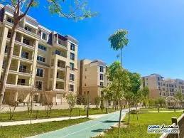 شقه 4غرف بخصم بتقسيط علي 12 سنه علي طريق السويس سراي