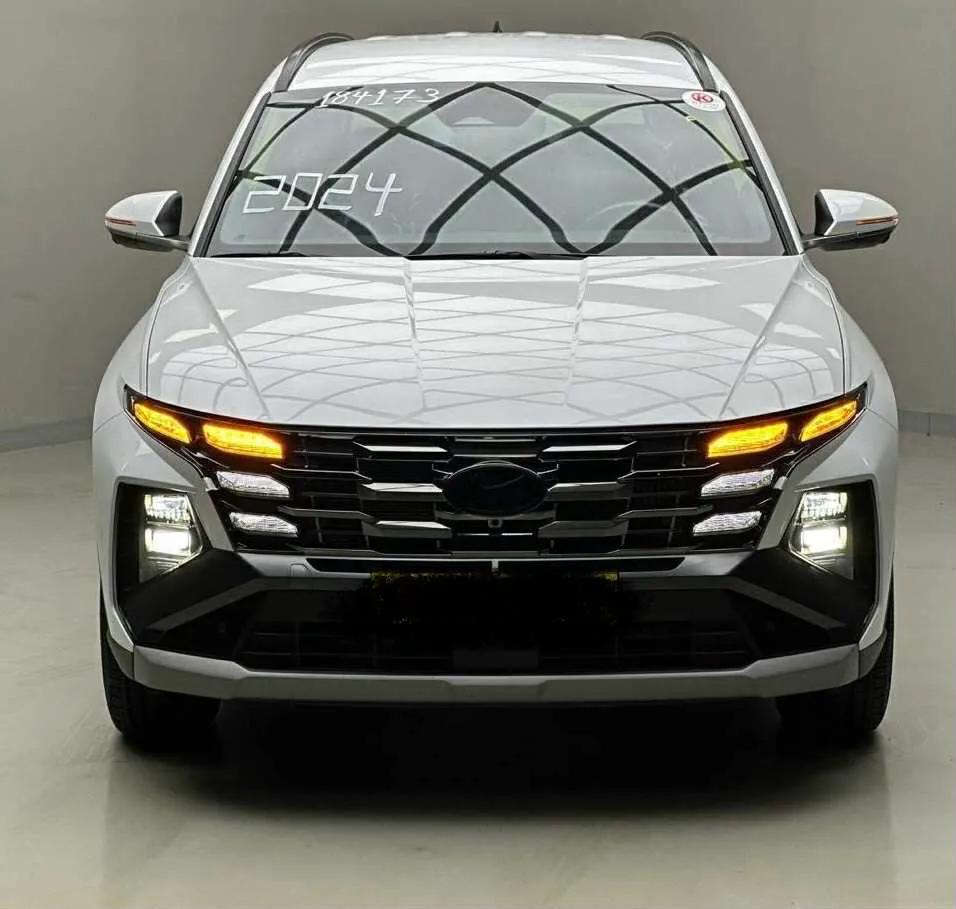 توسان هايبرد 2024