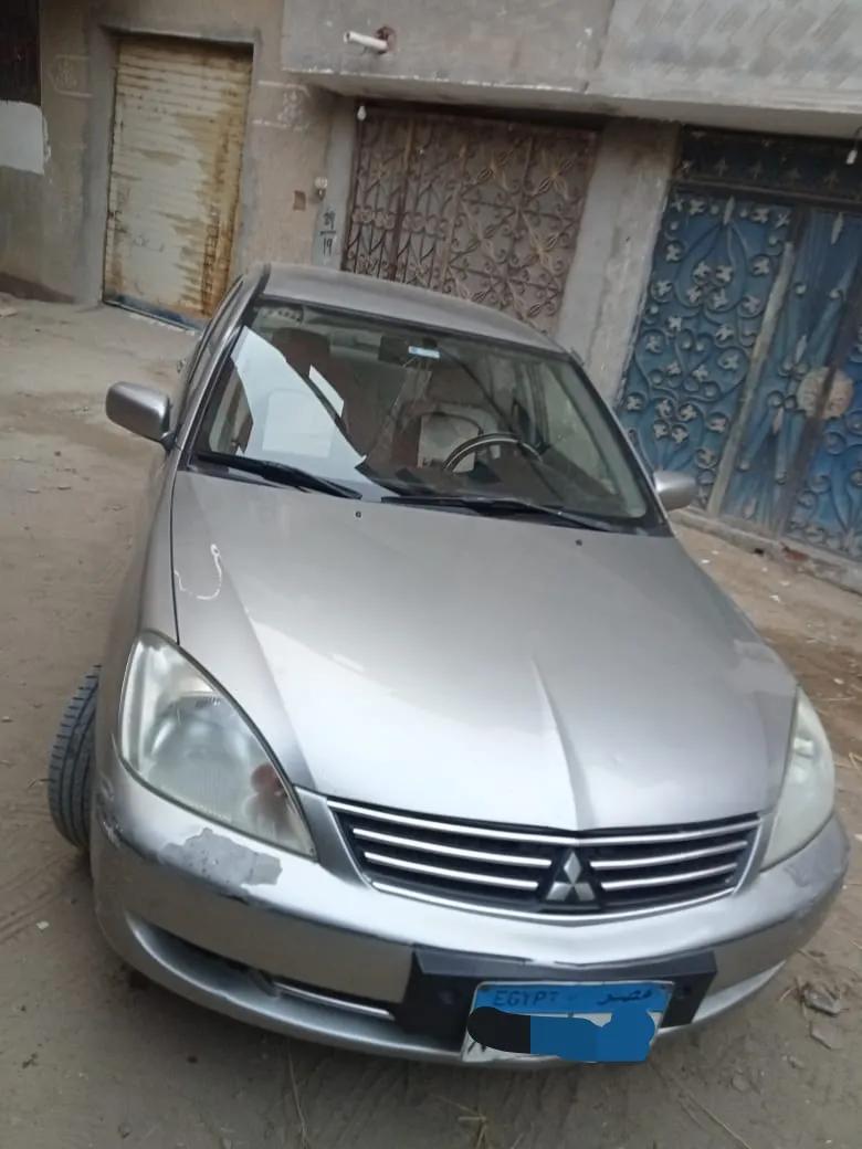 ميتسوبيشي لانسر2012 بومه فبريكا برا وجوا